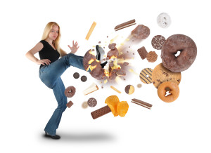 Diet Woman Kicking Donut Snacks on White